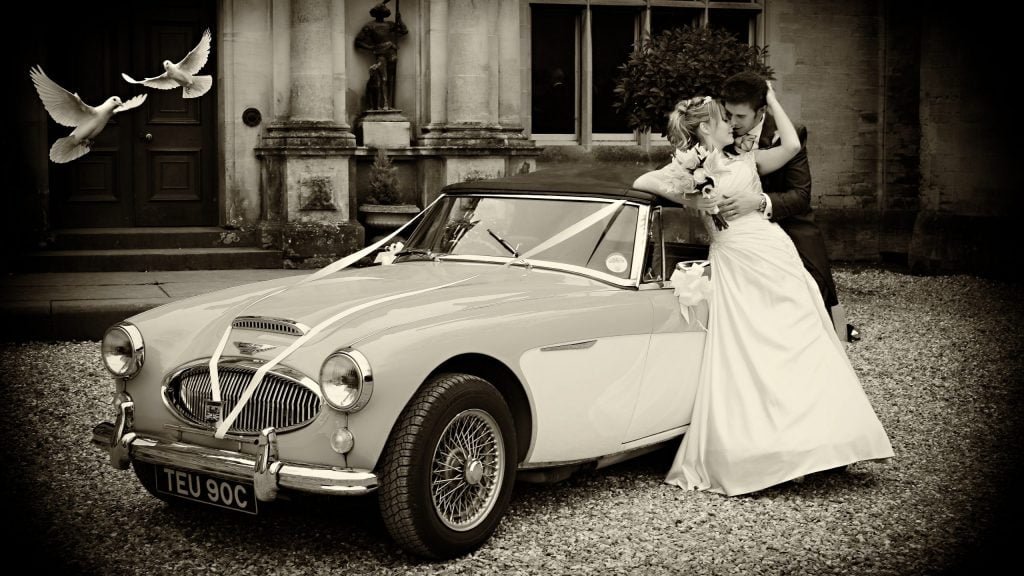 Orchardleigh House Wedding Photographer Classic Car Kiss