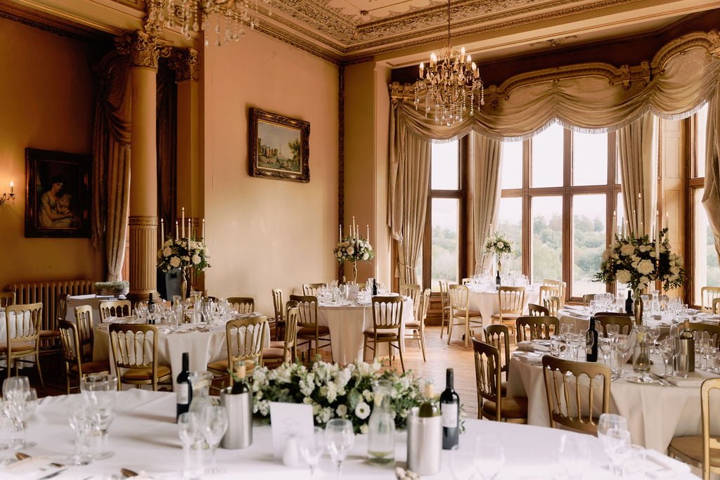 a dining room filled with lots of tables and chairs at Orchardleigh House