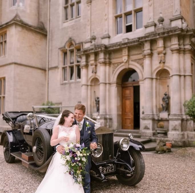 Bride and groom outside Orchardleigh House