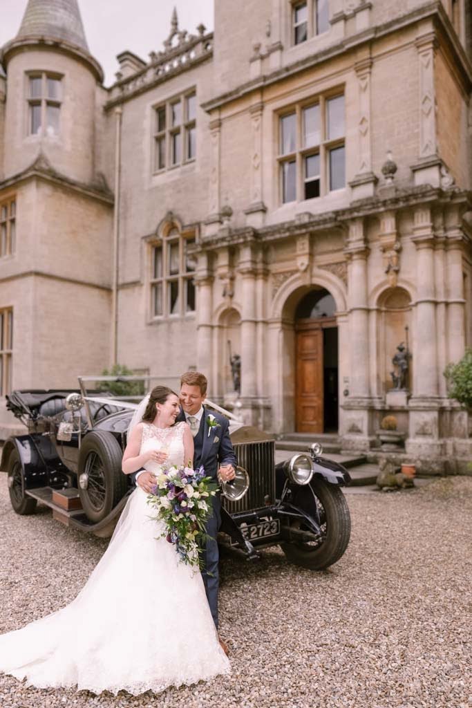 Bride and groom outside Orchardleigh House