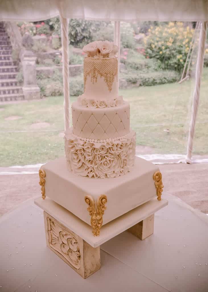 a wedding cake sitting on top of a table.