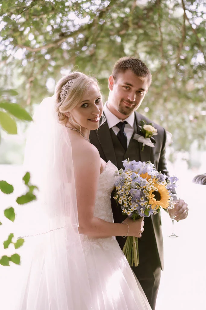 Wedding couple in dappled light