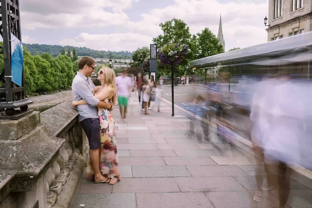 Pre-WeddingPhoto Shoot Im Bath:Photography Ideas:a man and a woman embracing on a bridge.