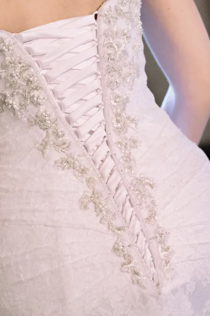 a close up of a dress on a woman.