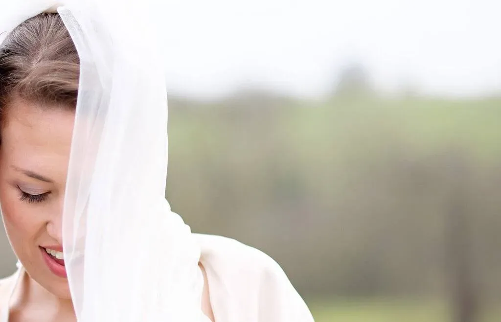 Wedding Photographer Bath: woman with a veil over her head.