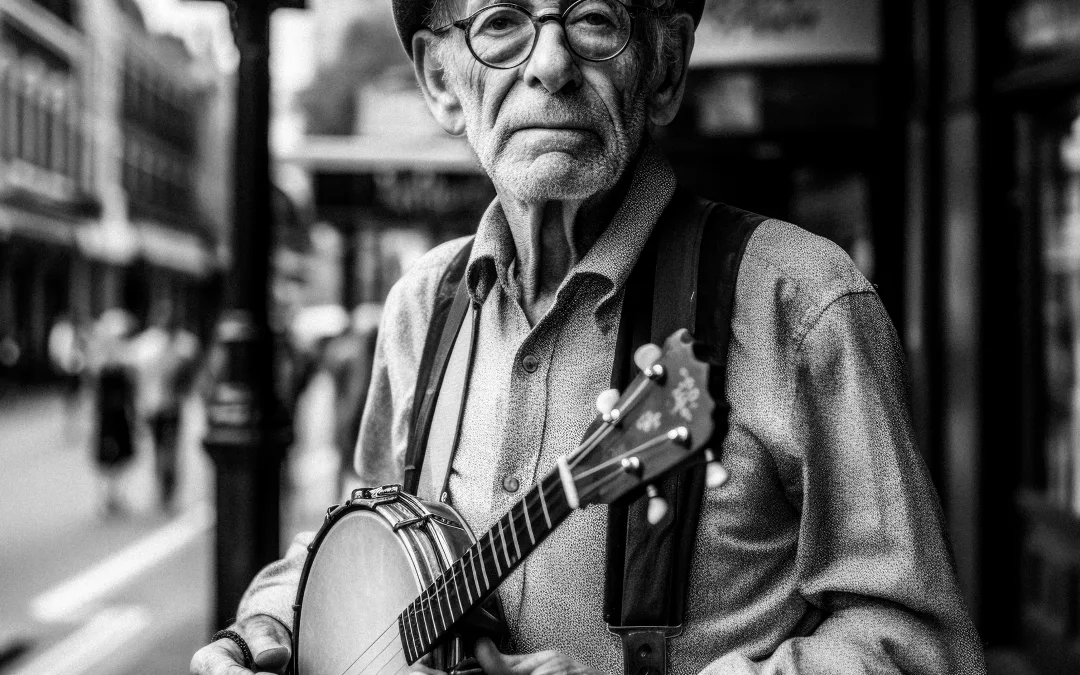 Street photo of a London man: a man holding a guitar on a city street.