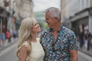 Weddings in Bath: a man and a woman walking down a street.