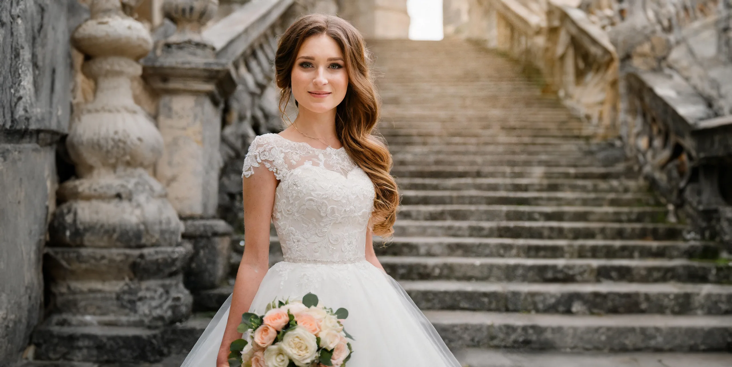 Bride on the Steps at The Manor Castle Combe