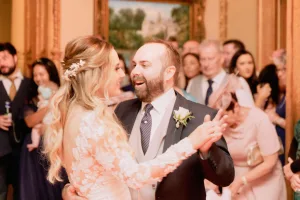 A bride and groom sharing their first dance at an Orchardleigh House wedding reception, beautifully captured by a talented wedding photographer.