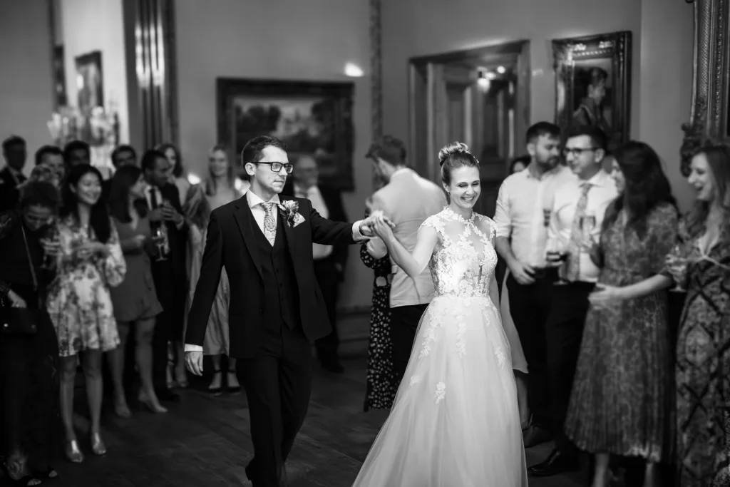 A bride and groom dancing in a large room. Orianne & Andrew at Orchardleigh House