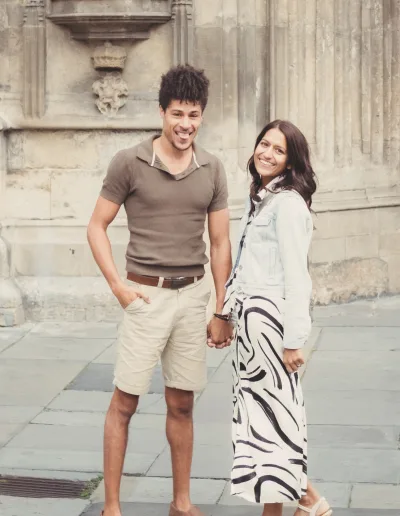 A man and woman standing in front of a building.Photo Shoot in Bath