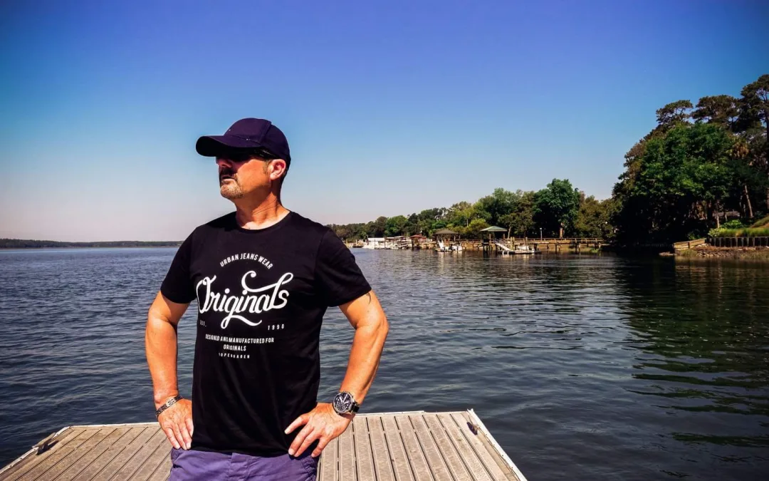 Michael Gane of thefxworks: A man standing on a dock next to a body of water.