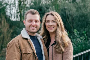 Stourhead Wedding Photographer14 A Stourhead wedding photographer captures a stunning photo of a man and woman posing in front of trees.