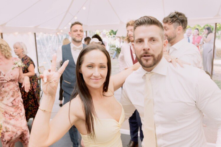 a man and a woman posing for a picture.