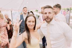 Wick Farm Wedding Photographer a man and a woman standing next to each other. Wedding Photography Prices UK. Seymours Court Local Wedding Expert