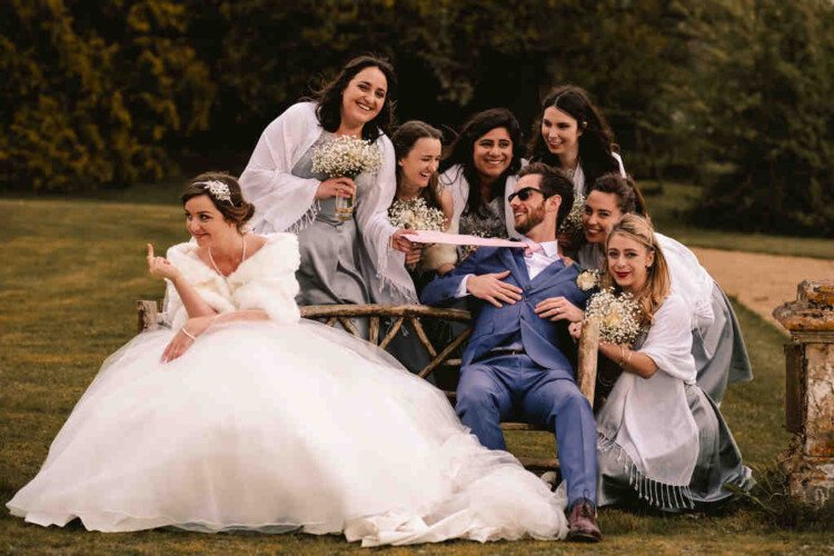Learning the skills of a bath wedding Photographer: a group of people posing for a picture.