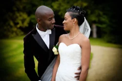 www.thefxworks.co.uk A smiling groom gazes at his bride outdoors on their wedding day at Orchardleigh House.