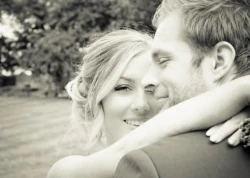 www.thefxworks.co.uk A black and white photo of a bride and groom hugging.