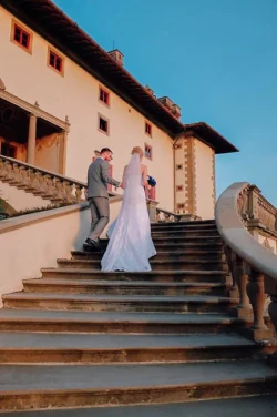 www.thefxworks.co.uk A bride and groom walking down the stairs of Farleigh House.