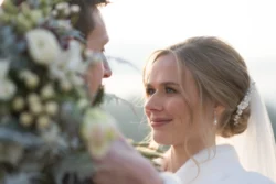 Orchardleigh Wedding Photographer capturing the meaningful moments between a bride and groom as they lovingly gaze at each other.
