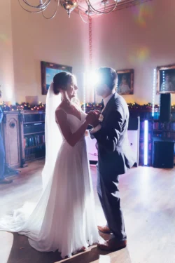 A bride and groom sharing their first dance at Orchardleigh House.